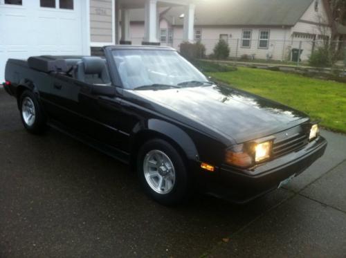 Photo Image Gallery & Touchup Paint: Toyota Celica in Gloss Black   (202)  YEARS: 1982-1985