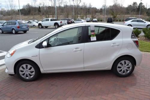 Photo Image Gallery & Touchup Paint: Toyota Priusc in Super White   (040)  YEARS: 2012-2013